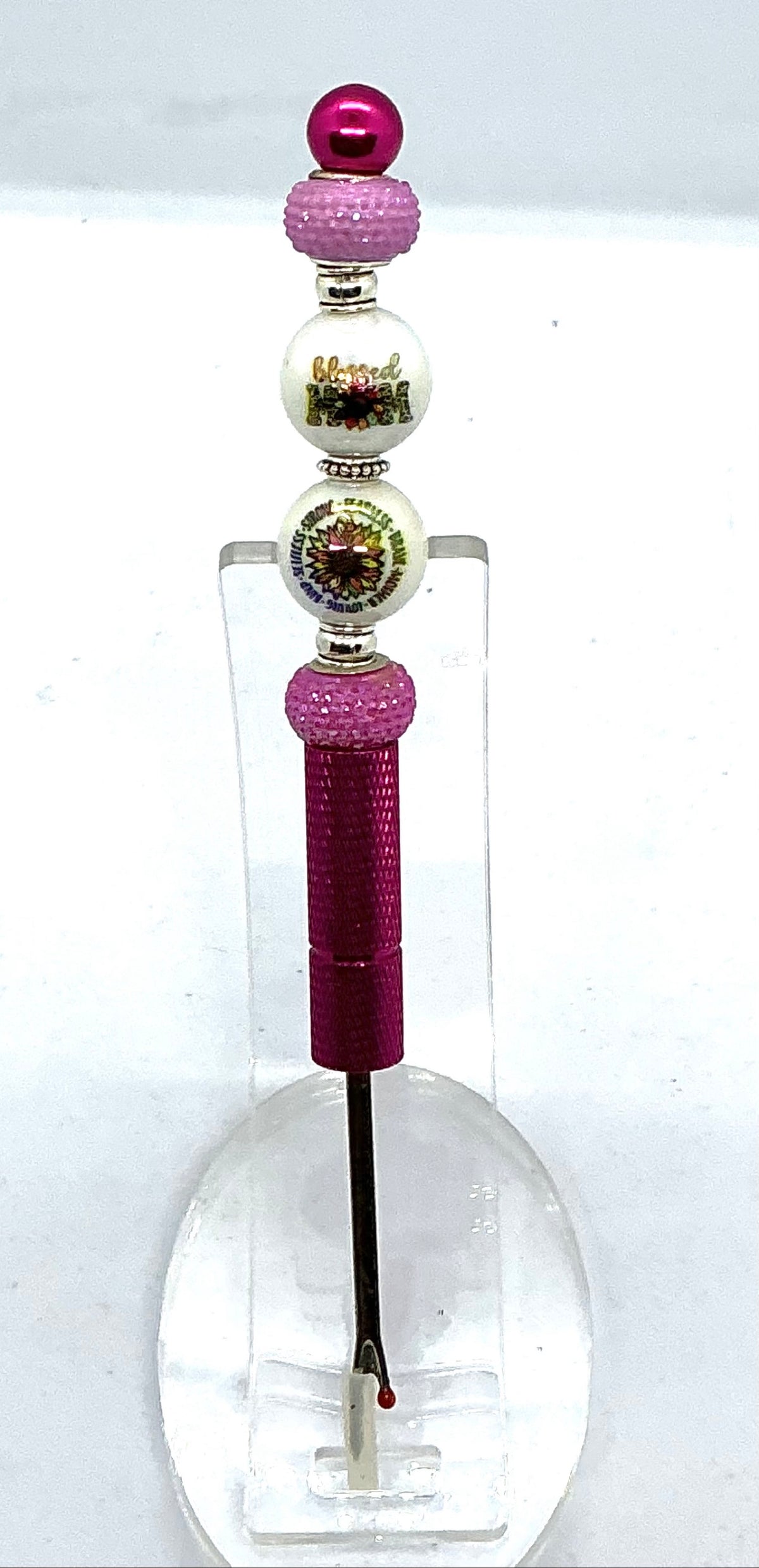 Beaded seam ripper with blessed mom and sunflower beads on a hot pink handle