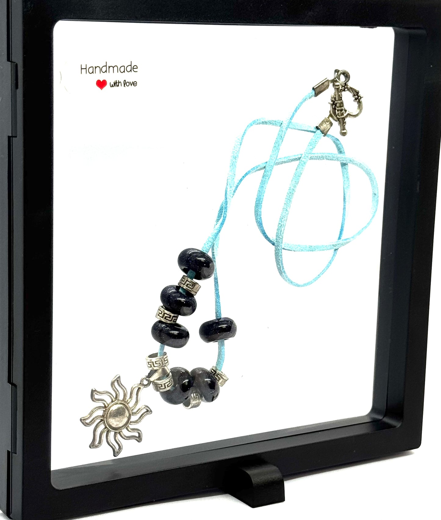 Sky Blue Cord Sun Charm Necklace | 23” Handmade Beaded Necklace | Black Glass Beads | Toggle Clasp Statement Piece