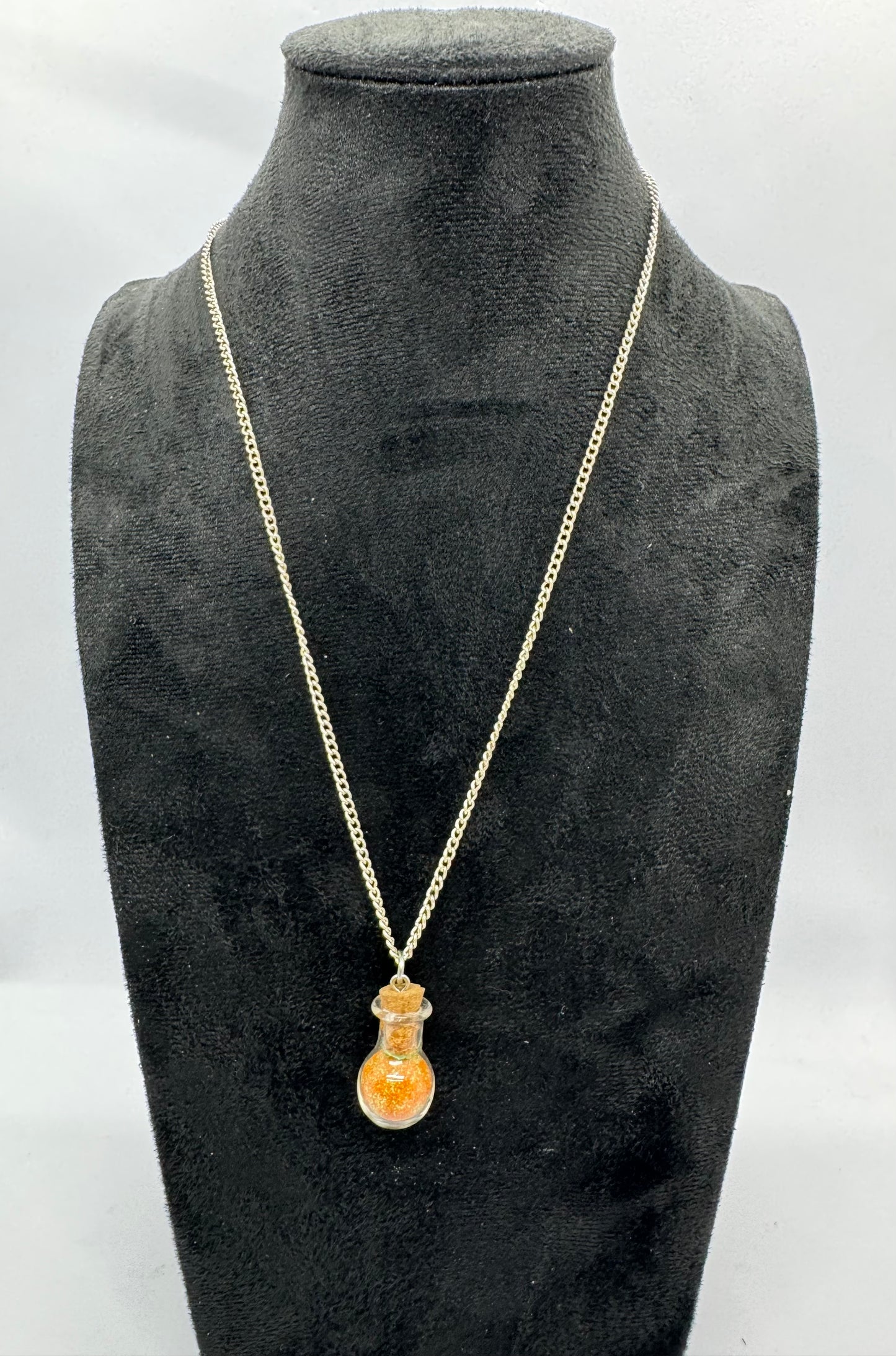 #7G “Sunset Spiral Potion Bottle Necklace – Pretty Decisions, Bad Outcomes”