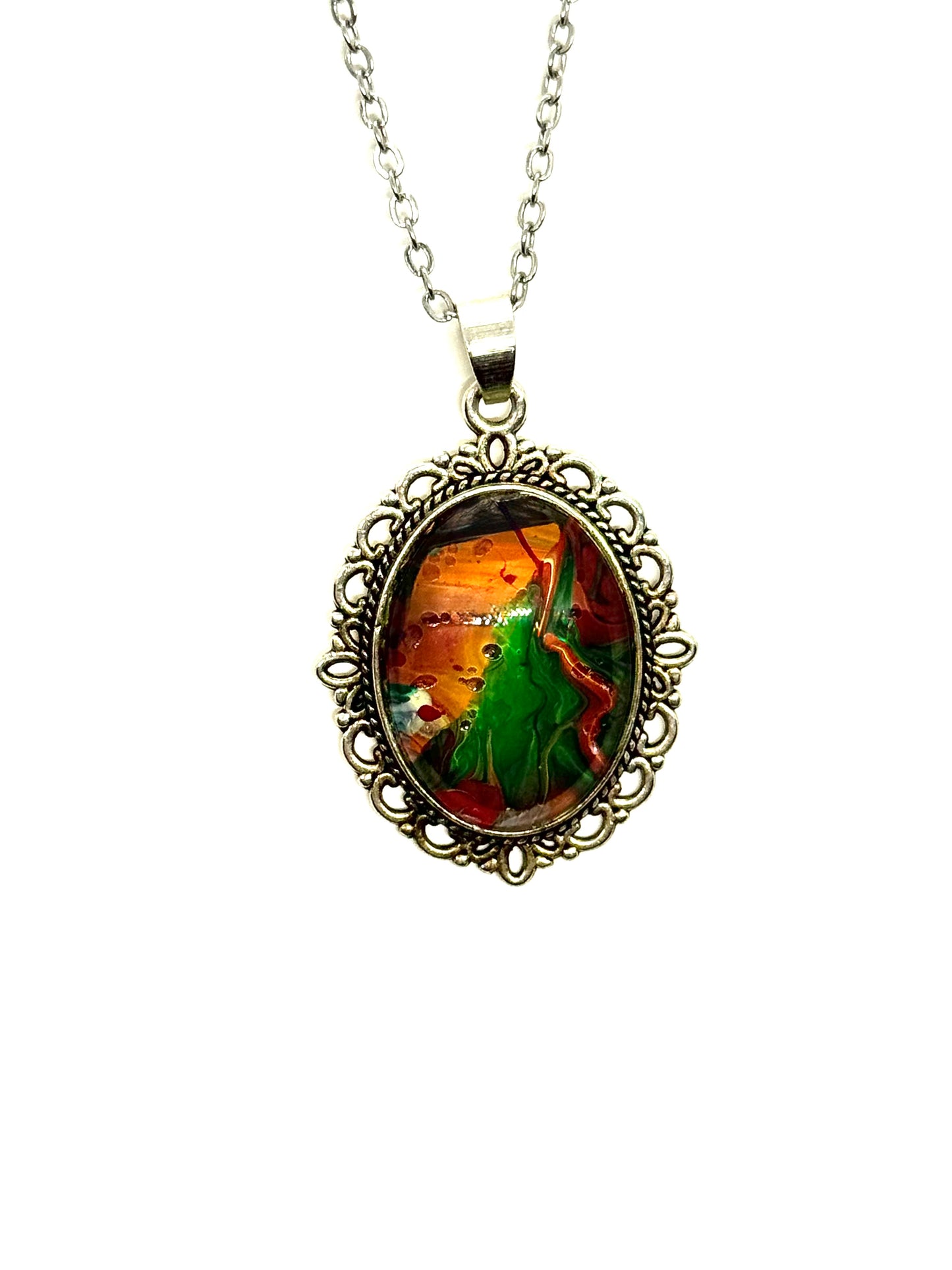 #23 “Don’t Look Too Long” Oval Pendant Necklace – Orange, Green & Red Paint Pour with Hidden Faces