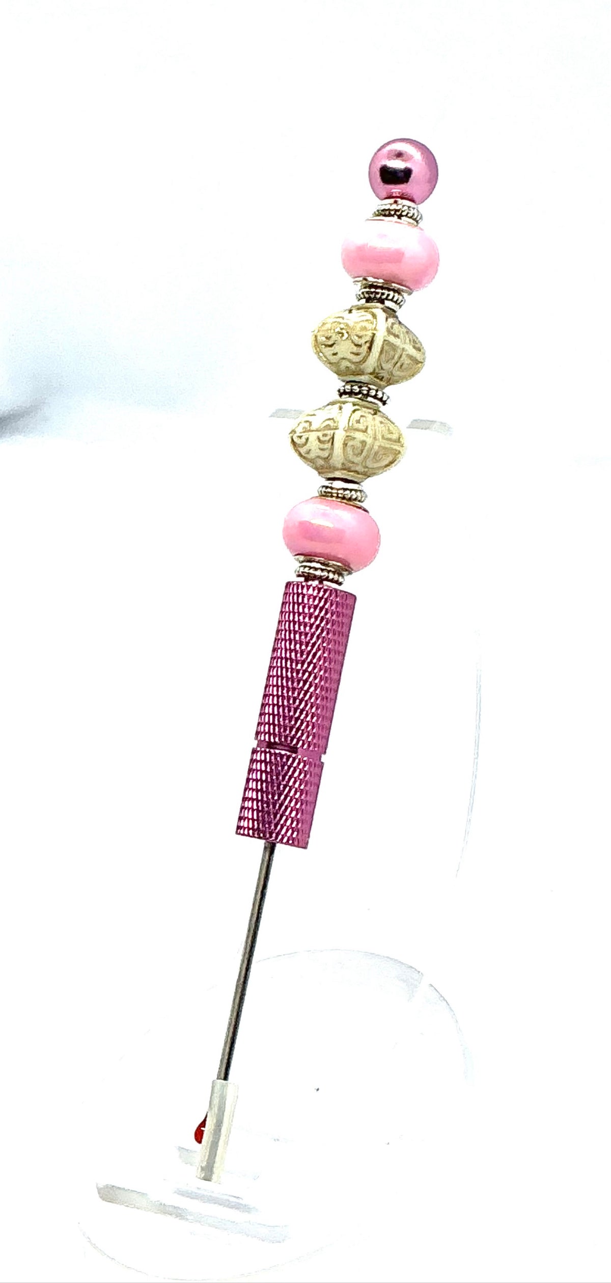 Beaded seam ripper with pink pearl and carved ivory-look beads on a pink handle