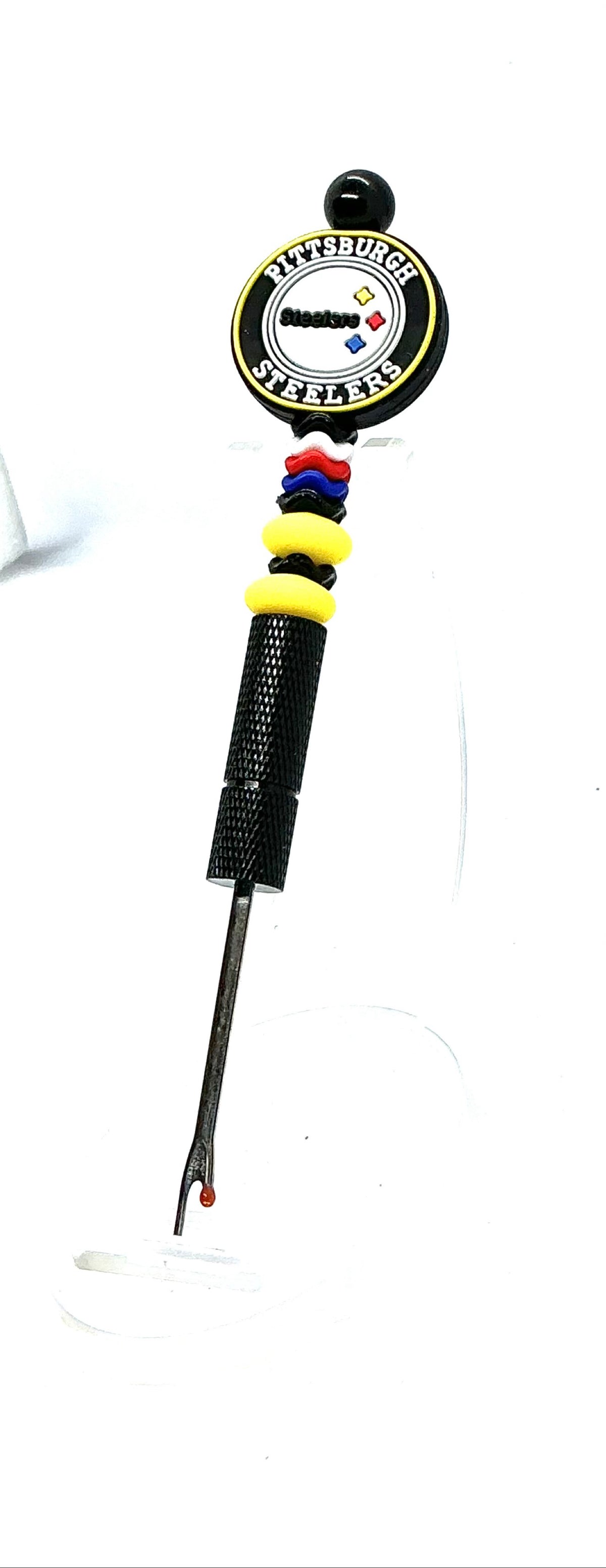 Beaded seam ripper with Pittsburgh football focal bead and black and gold beads on a black handle
