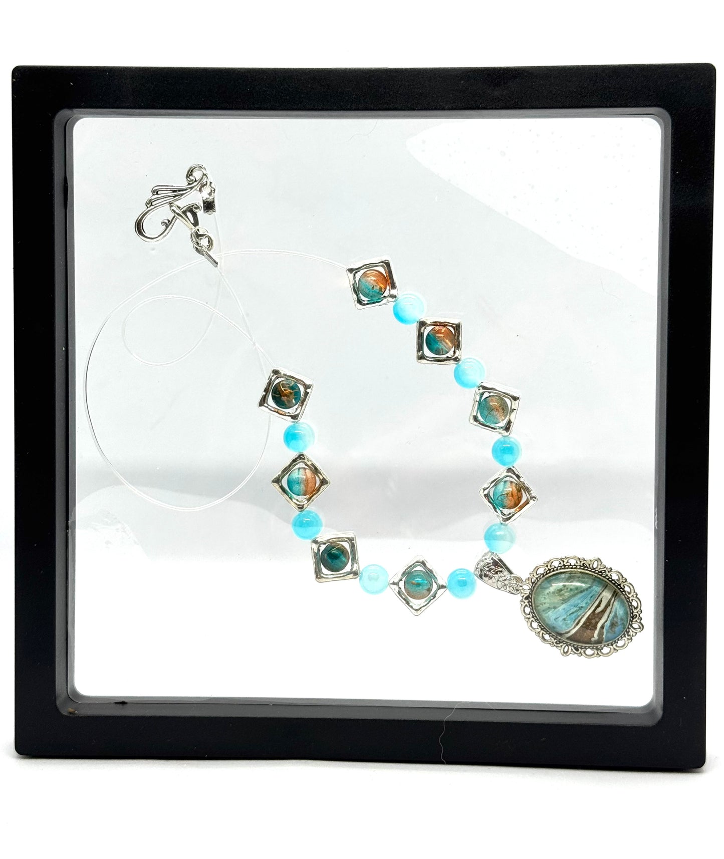 Ocean Current Necklace – Handmade Aqua Beaded Necklace with Coastal Artisan Pendant