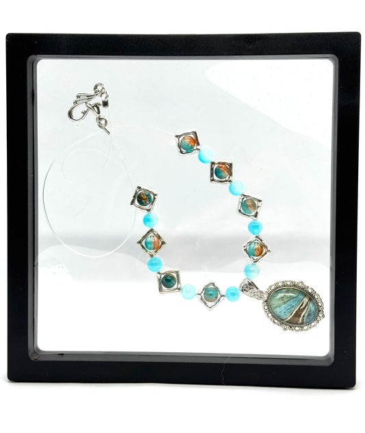 Ocean Current Necklace – Handmade Aqua Beaded Necklace with Coastal Artisan Pendant