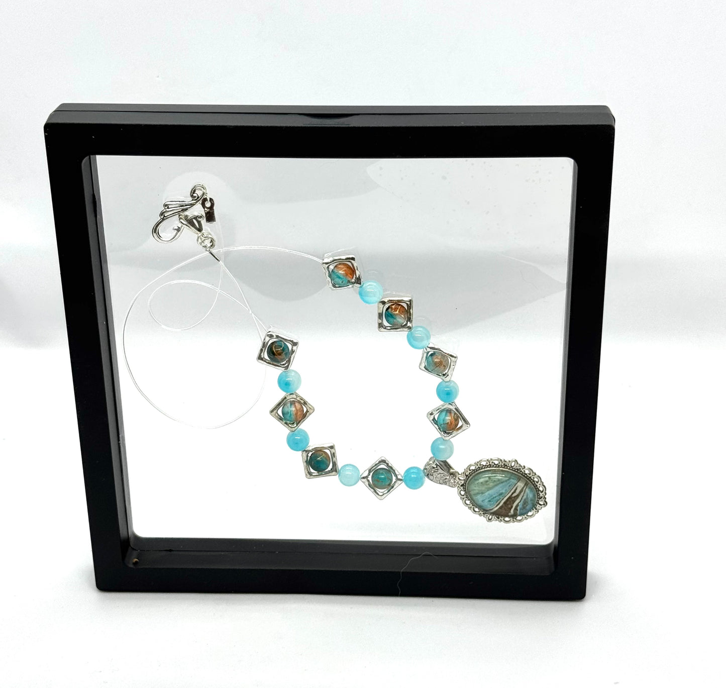 Ocean Current Necklace – Handmade Aqua Beaded Necklace with Coastal Artisan Pendant