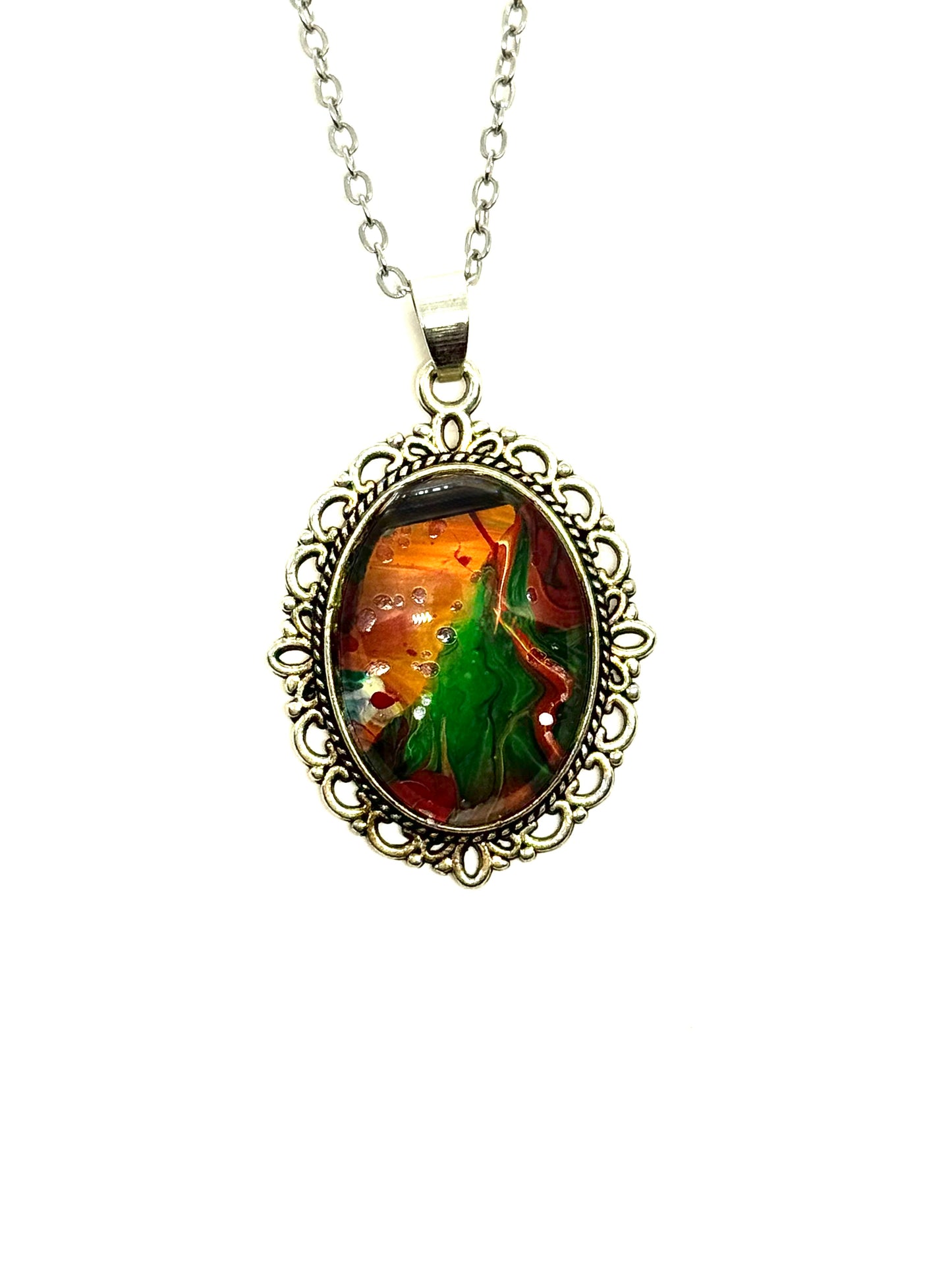 #23 “Don’t Look Too Long” Oval Pendant Necklace – Orange, Green & Red Paint Pour with Hidden Faces