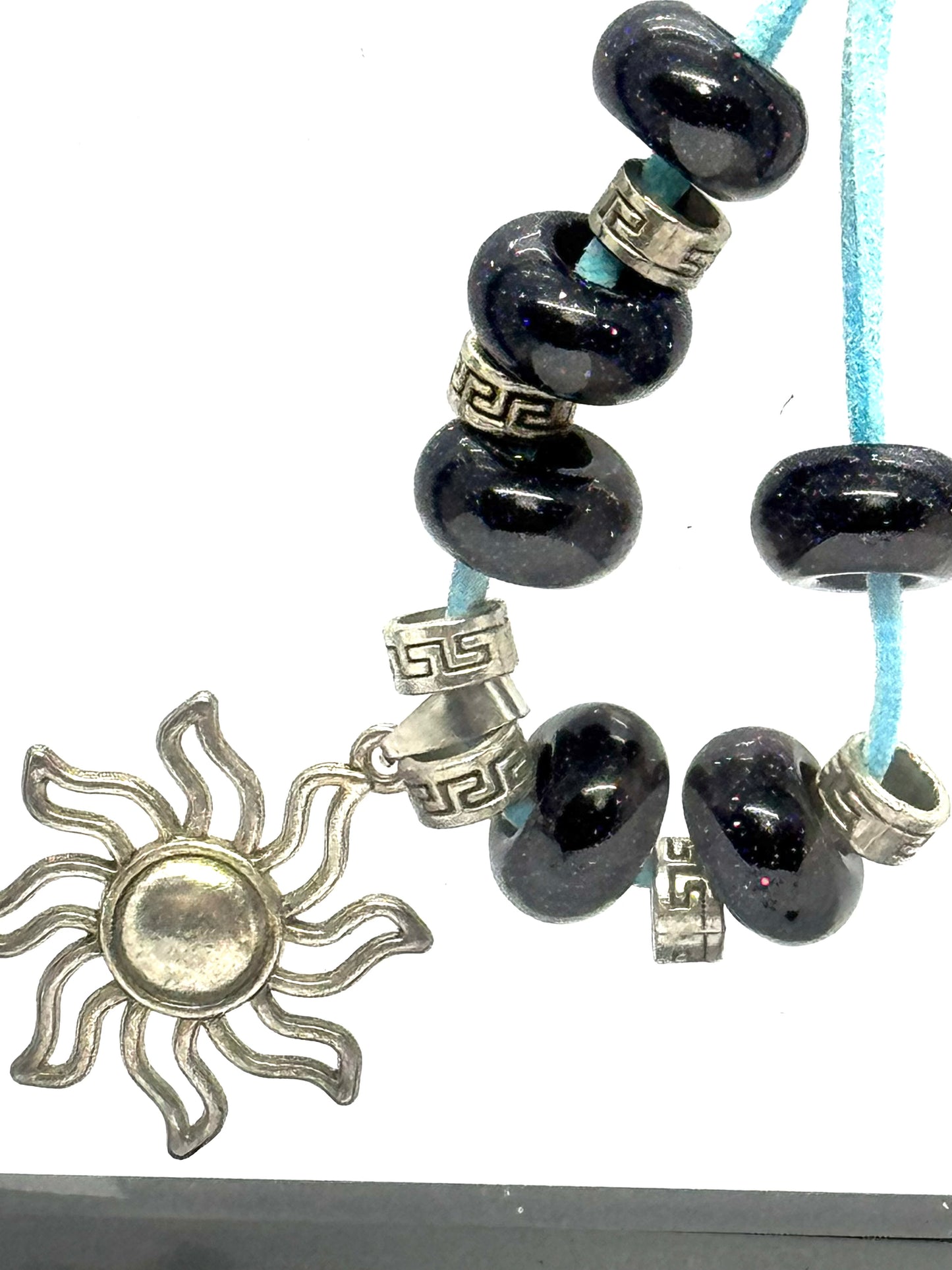 Sky Blue Cord Sun Charm Necklace | 23” Handmade Beaded Necklace | Black Glass Beads | Toggle Clasp Statement Piece