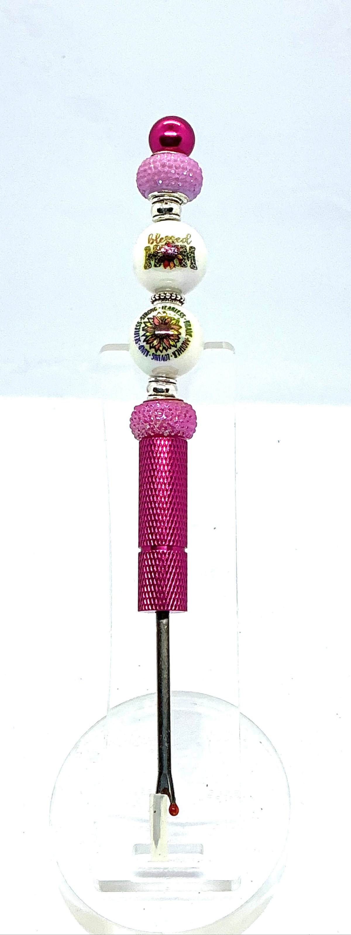 Beaded seam ripper with blessed mom and sunflower beads on a hot pink handle