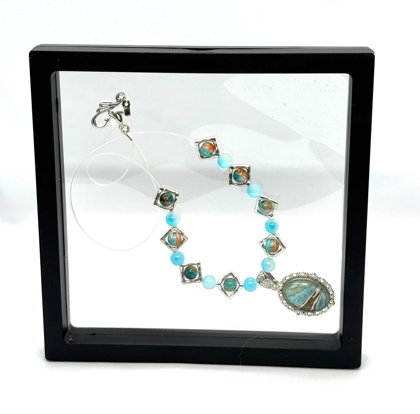 Ocean Current Necklace – Handmade Aqua Beaded Necklace with Coastal Artisan Pendant
