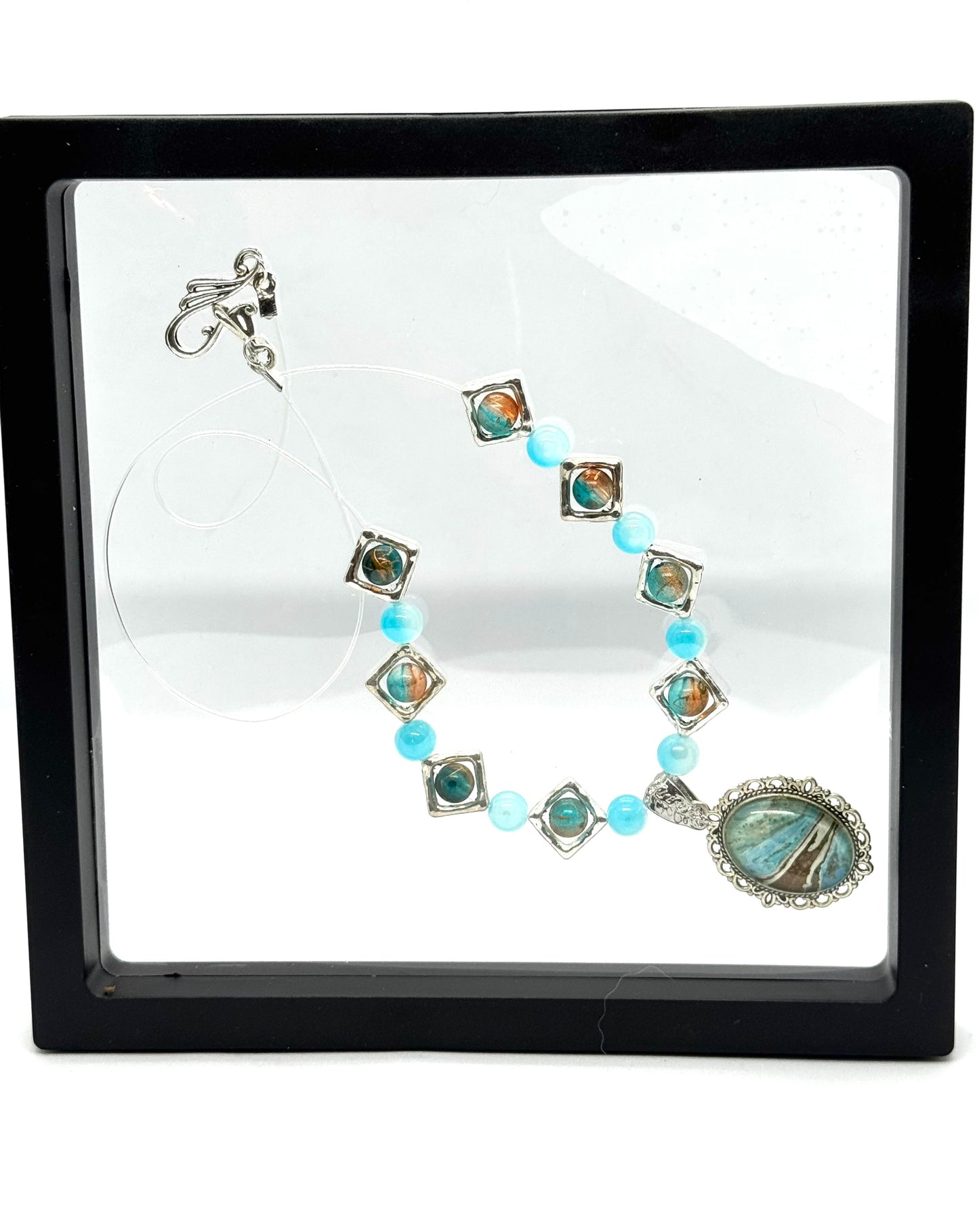 Ocean Current Necklace – Handmade Aqua Beaded Necklace with Coastal Artisan Pendant