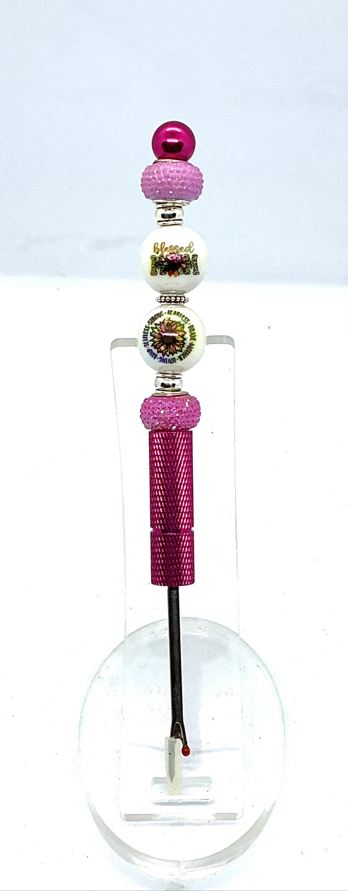 Beaded seam ripper with blessed mom and sunflower beads on a hot pink handle