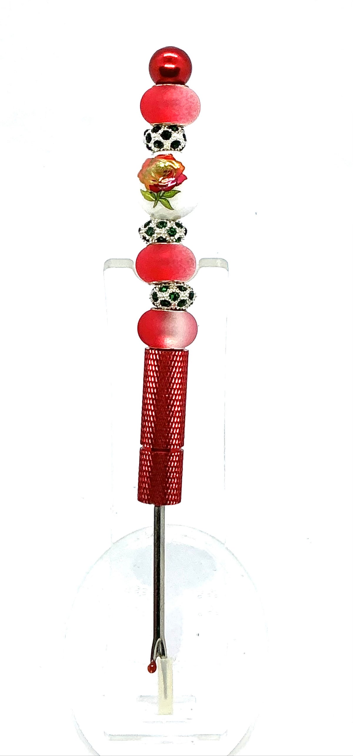Beaded seam ripper with painted red rose bead and frosted red beads on a red handle