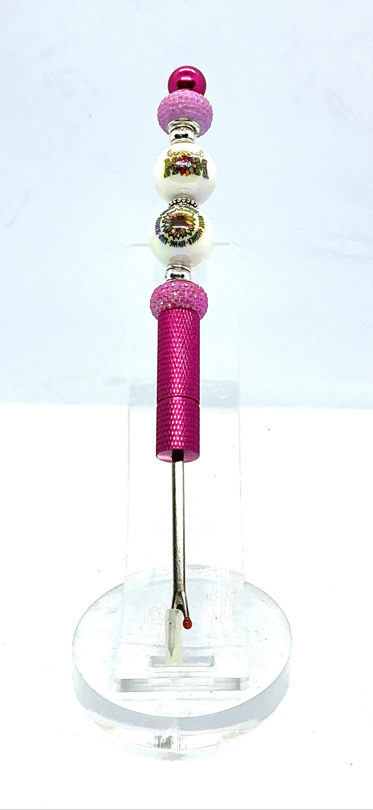 Beaded seam ripper with blessed mom and sunflower beads on a hot pink handle
